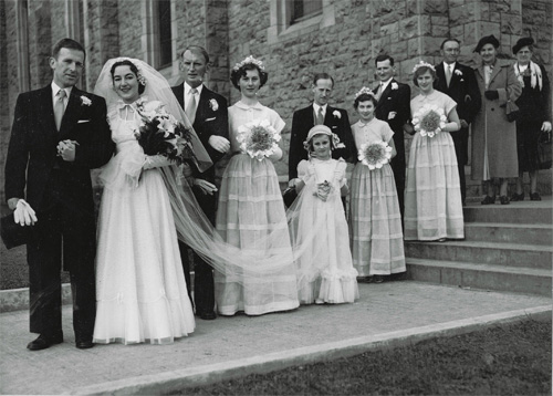 (15th October 1952) Left to Right: best man, Thomas Larkin, a boyhood friend my father's who also served in the army with him; maid of honour, Noreen Ahern; Michael Corbett and Kathleen Moakley; Paddy Corbett and two unidentified girls, both Patsy's friends; Connie and his second wife May McNamara (nee Moakley); and Nora Corbett (nee Brassil), her husband Patrick passed away in 1945.