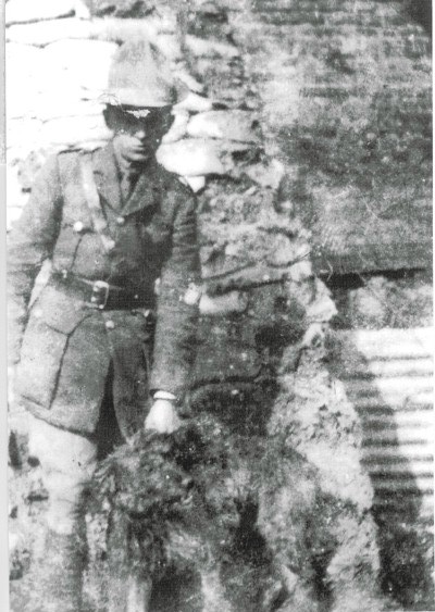 An early picture of Connie in a volunteer uniform circa 1917, it is not known which side the dog was on, or why he was being held prisoner by Connie.